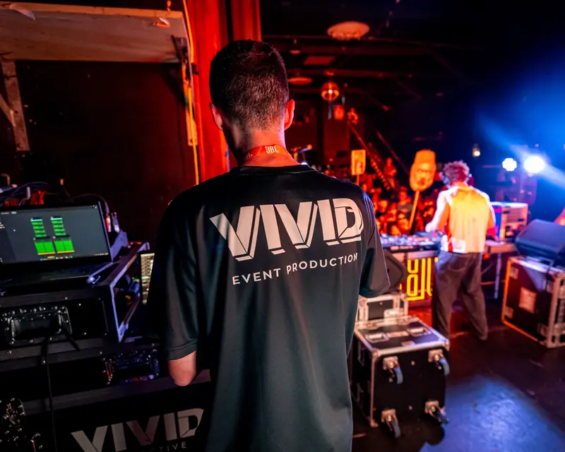 Vivid Event Production crew member working backstage at a live event